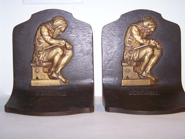 A Pair of Antique Bookends by Bradley & Hubbard circa 1920 entitled "SCIENCE and depicting a Monk reading a Book